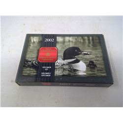 2002P 7-COIN SPECIMEN SET IN CASE OF ISSUE. INCLUDES THE LOON FAMILY LOONIE.