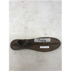 A RUSTY SHOEMAKERS TOOL