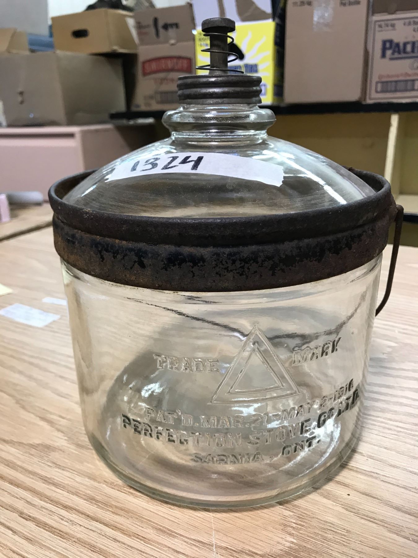 KEROSENE GLASS CONTAINER, TRADE MARK: TRIANGLE INSIDE TRIANGLE , PAT'D ...