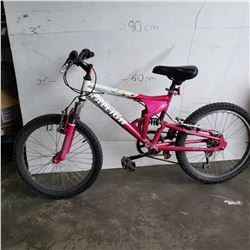 PINK AND WHITE RALEIGH BIKE