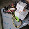 Image 1 : Fall-arrest harnesses and three boxes of disposable ear plugs