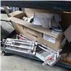 Image 1 : 2 tile cutters with box of flexible duct and more
