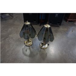 Pair of brass and smoked glass lamps