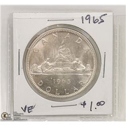1965 SILVER DOLLAR COIN.
