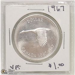 1967 SILVER DOLLAR COIN.