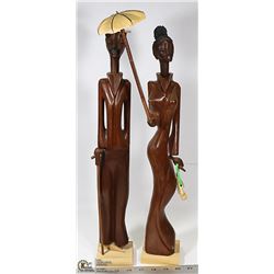 TWO WOOD CARVED STATUES FROM CUBA