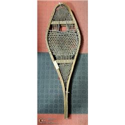 ONE PAIR OF ANTIQUE SNOWSHOES WITH RED WOOL TRIMS
