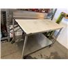 Image 1 : Stainless Steel Cutting Table 6 feet with cutting boards on wheels