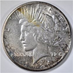 1924-S PEACE DOLLAR, AU TONED