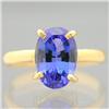 Image 1 : Modern 18 kt. Yellow Gold Tanzanite Ring #1093713