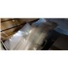 Image 4 : Four boxes of plastic bags and coveralls