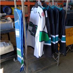 5 new hockey jerseys and canucks flag