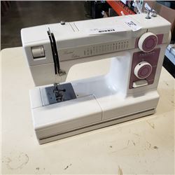 JANOME LIMITED EDITION SEWING MACHINE AND RCA MICROWAVE