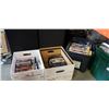 Image 1 : 2 BOXES OF DVDS AND TOTE OF DISNEY VHS MOVIES