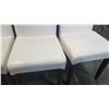 Image 4 : 4 LEATHER LOOK CHAIRS
