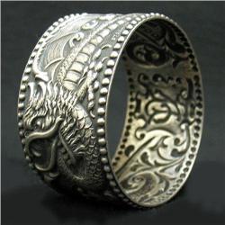 Sterling silver napkin ring with repousse dr