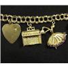 Image 2 : 14k gold charm bracelet with charms includin