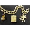 Image 3 : 14k gold charm bracelet with charms includin