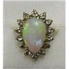 Image 1 : 14k gold opal and diamond ring; pear shaped 
