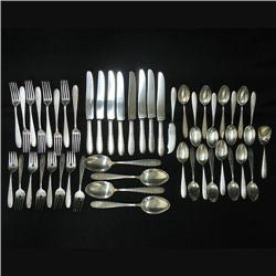 Set of sterling silver flatware by the Manch