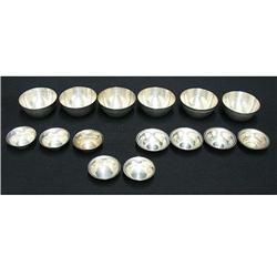 Grouping of fifteen Egyptian silver bowls in