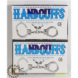 TWO HANDCUFFS WITH KEYS