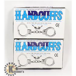 TWO HANDCUFFS WITH KEYS
