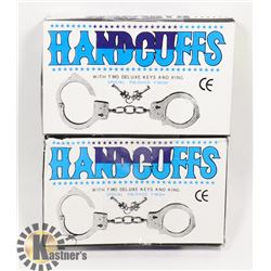 TWO HANDCUFFS WITH KEYS