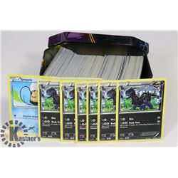 POKEMON TIN WITH APROX 300 CARDS(MIXED)