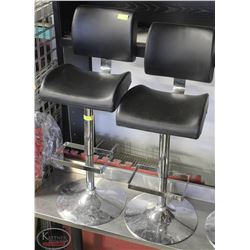 TWO BLACK LEATHERETTE ADJUSTABLE CHAIRS