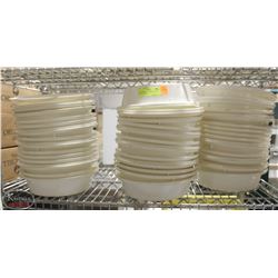 TWO STACKS OF WHITE PLASTIC PLATE COVERS