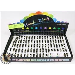 DISPLAY OF 100 MOOD RINGS WITH DOLPHINS, ASSORTED