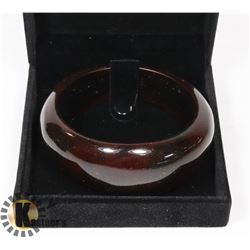 HARD RED PLASTIC BANGLE BRACELET WITH SPARKLES