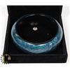 Image 1 : TEAL WOODEN BANGLE BRACELET WITH SPIRAL DESIGN