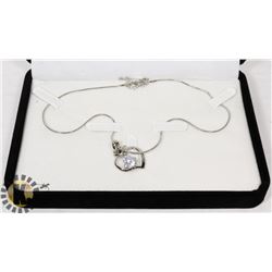 SILVER TONED DUAL HEART NECKLACE WITH RHINESTONE