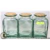 Image 1 : GREEN GLASS LARGE CANISTERS WITH CORK TOPS- SET