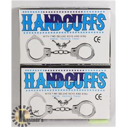 TWO HANDCUFFS WITH KEYS