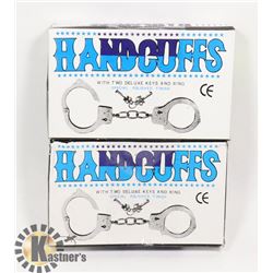 TWO HANDCUFFS WITH KEYS