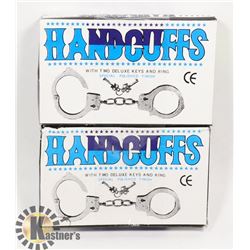 TWO HANDCUFFS WITH KEYS