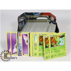 POKEMON TIN WITH APROX 300 CARDS(MIXED)