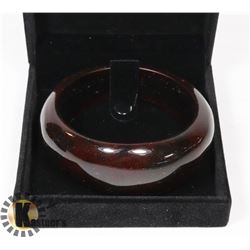 HARD RED PLASTIC BANGLE BRACELET WITH SPARKLES