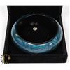 Image 1 : TEAL WOODEN BANGLE BRACELET WITH SPIRAL DESIGN