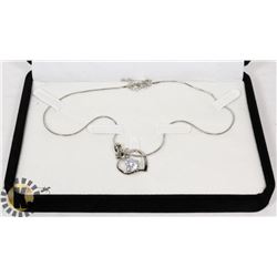 SILVER TONED DUAL HEART NECKLACE WITH RHINESTONE