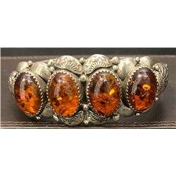 Amber 4 stone bracelet by Clem Nalwood, Navajo