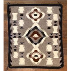 Navajo Weaving by Maybelle Many Mules