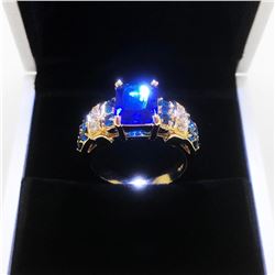 Ladies 6K Tanzanite Stone Ring, Mounted On Gold Tone Band With Inset Semi-Precious Stones