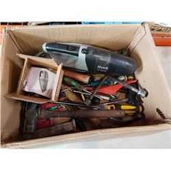 Box of tools and shark vacuum