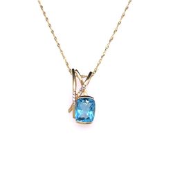 14Kt Gold 3.20Ct Blue Topaz & 0.06Ct Natural Diamond Pendant With 14Kt Gold Chain