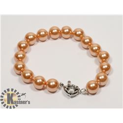 #129-SEA SHELL PEARL BRACELET 10mm/ 8"