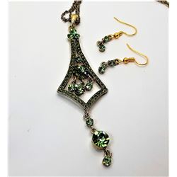 12) PERIDOT GREEN COLORED CRYSTAL